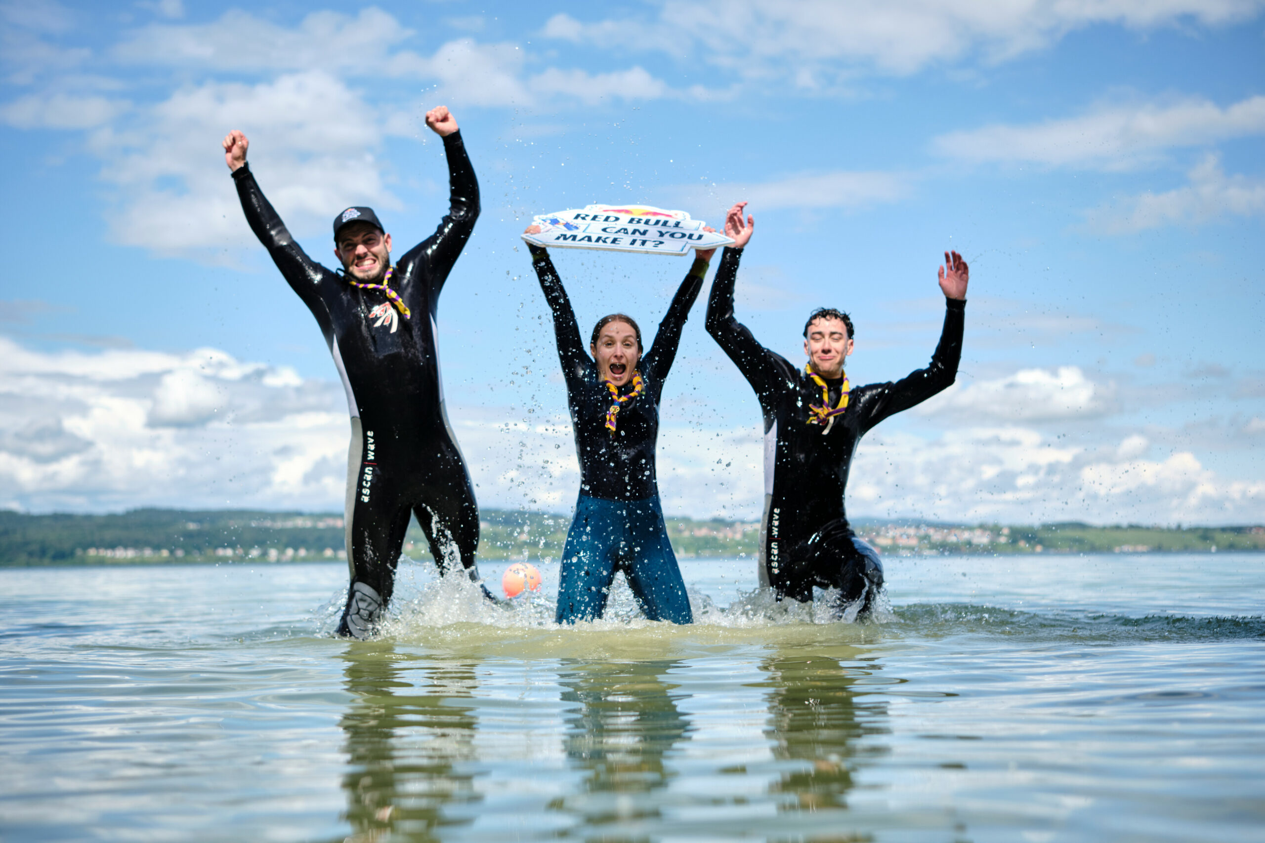 Contestants jumping out of the water celebrating after completing their challenge the Red Bull Can You Make It 2024 checkpoint in Constance, Germany on May 22nd 2024 // Philipp Uricher / Red Bull Content Pool // SI202405230506 // Usage for editorial use only //