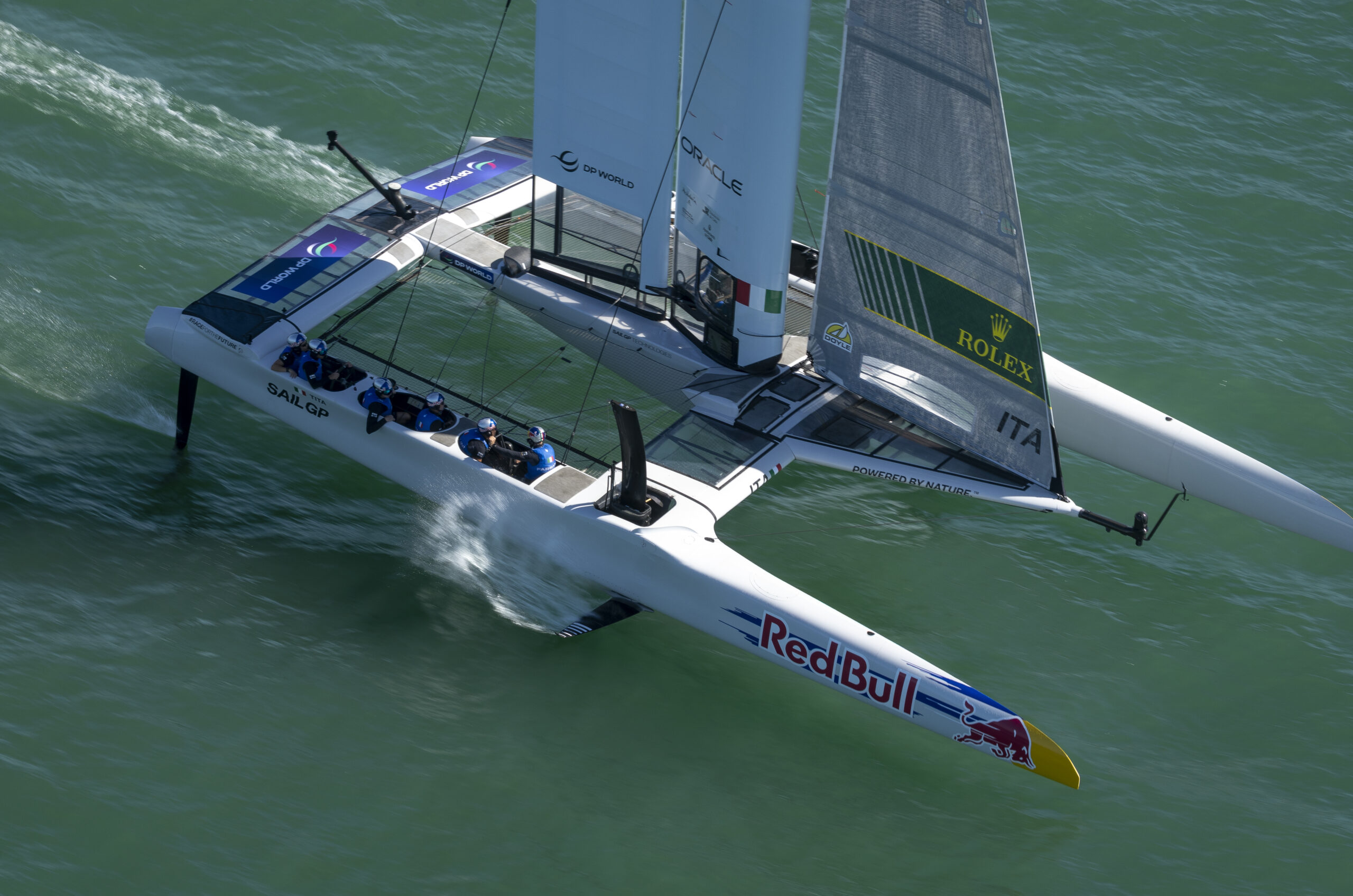 An aerial view of the Red Bull Italy SailGP F50 catamaran helmed by Ruggero Tita in action during a practice session ahead of the DP World Spain Sail Grand Prix held in Cadiz, Spain Friday 3 October 2025. Rolex SailGP Championship Event 11 2025 Season. Photo: Samo Vidic for SailGP. Handout image supplied by SailGP