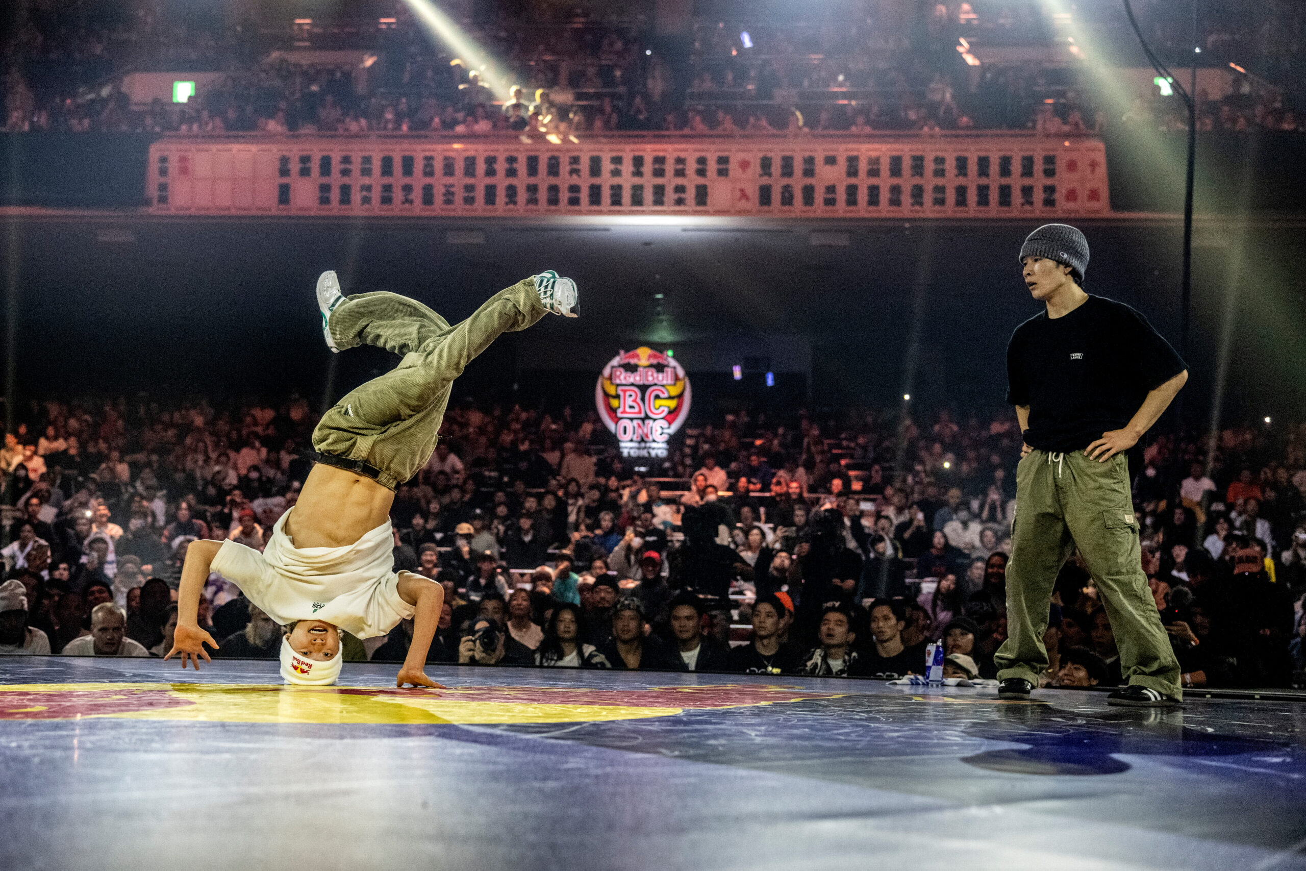 B-boy Issin (L) of Japan competes against Haruto of Japan during the Red Bull BC One World Final at Ryogoku Kokugikan Sumo Arena, Tokyo, Japan on November 9, 2025. // Dean Treml / Red Bull Content Pool // SI202511090321 // Usage for editorial use only //