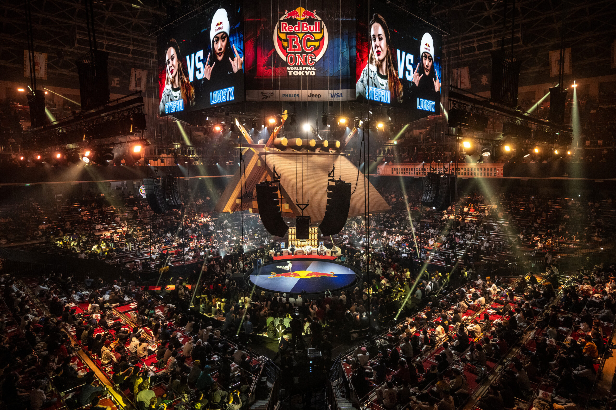 B-girl Logistix of the USA competes against Stefani of the UK during the Red Bull BC One World Final at Ryogoku Kokugikan Sumo Arena, Tokyo, Japan on November 9, 2025. // Dean Treml / Red Bull Content Pool // SI202511090331 // Usage for editorial use only //