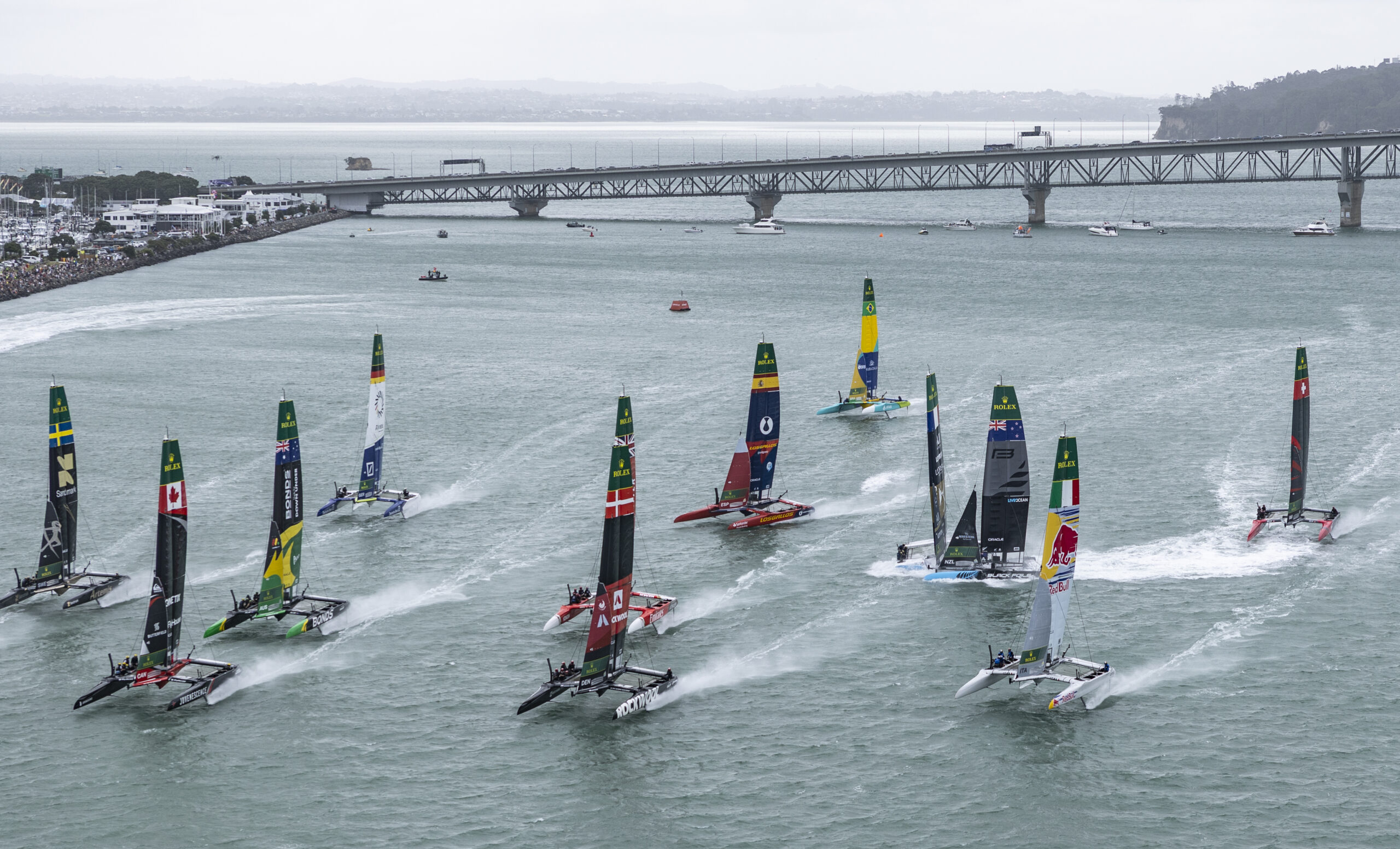 SailGP F50 catamaran fleet with Black Foils SailGP Team helmed by Peter Burling and DS Automobiles SailGP Team France helmed by Quentin Delapierre colliding, on Race Day 1 of the ITM New Zealand Sail Grand Prix in Auckland, New Zealand. Saturday 14 February 2026. Rolex SailGP Championship Event 2 2026 Season. Photo: Simon Bruty for SailGP. Handout image supplied by SailGP