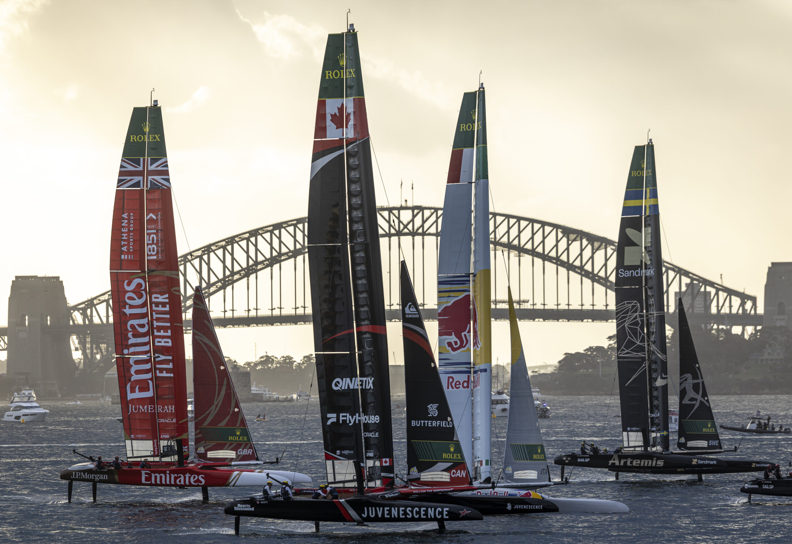 Artemis SailGP Team helmed by Nathan Outteridge leads Red Bull Italy SailGP Team helmed by Phil Robertson, NORTHSTAR SailGP Team helmed by Giles Scott and Emirates Great Britain SailGP Team helmed by Dylan Fletcher in action on Race Day 1 of the KPMG Australia Sail Grand Prix in Sydney, Australia. Saturday 28 February 2026. Rolex SailGP Championship Event 3 2026 Season. Photo: Travis Hayto for SailGP. Handout image supplied by SailGP