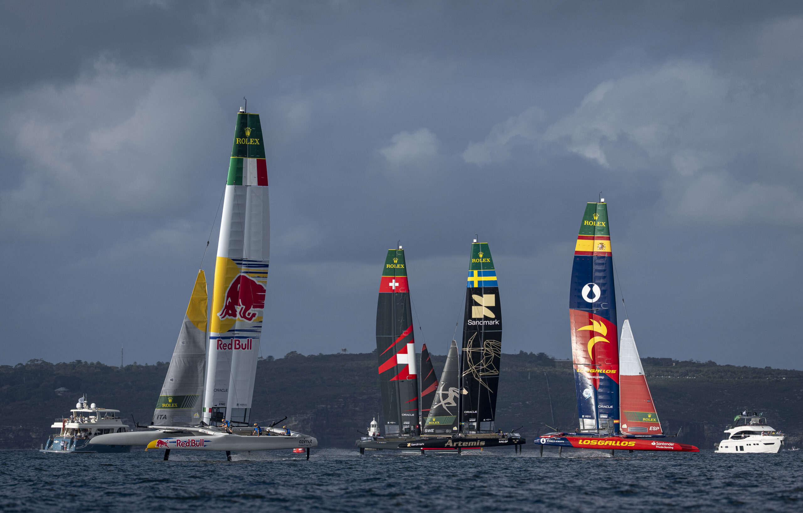 Red Bull Italy SailGP Team helmed by Phil Robertson lead Los Gallos SailGP Team, Artemis SailGP Team and Switzerland SailGP Team in action on Race Day 1 of the KPMG Australia Sail Grand Prix in Sydney, Australia. Saturday 28 February 2026. Rolex SailGP Championship Event 3 2026 Season. Photo: Jason Ludlow for SailGP. Handout image supplied by SailGP