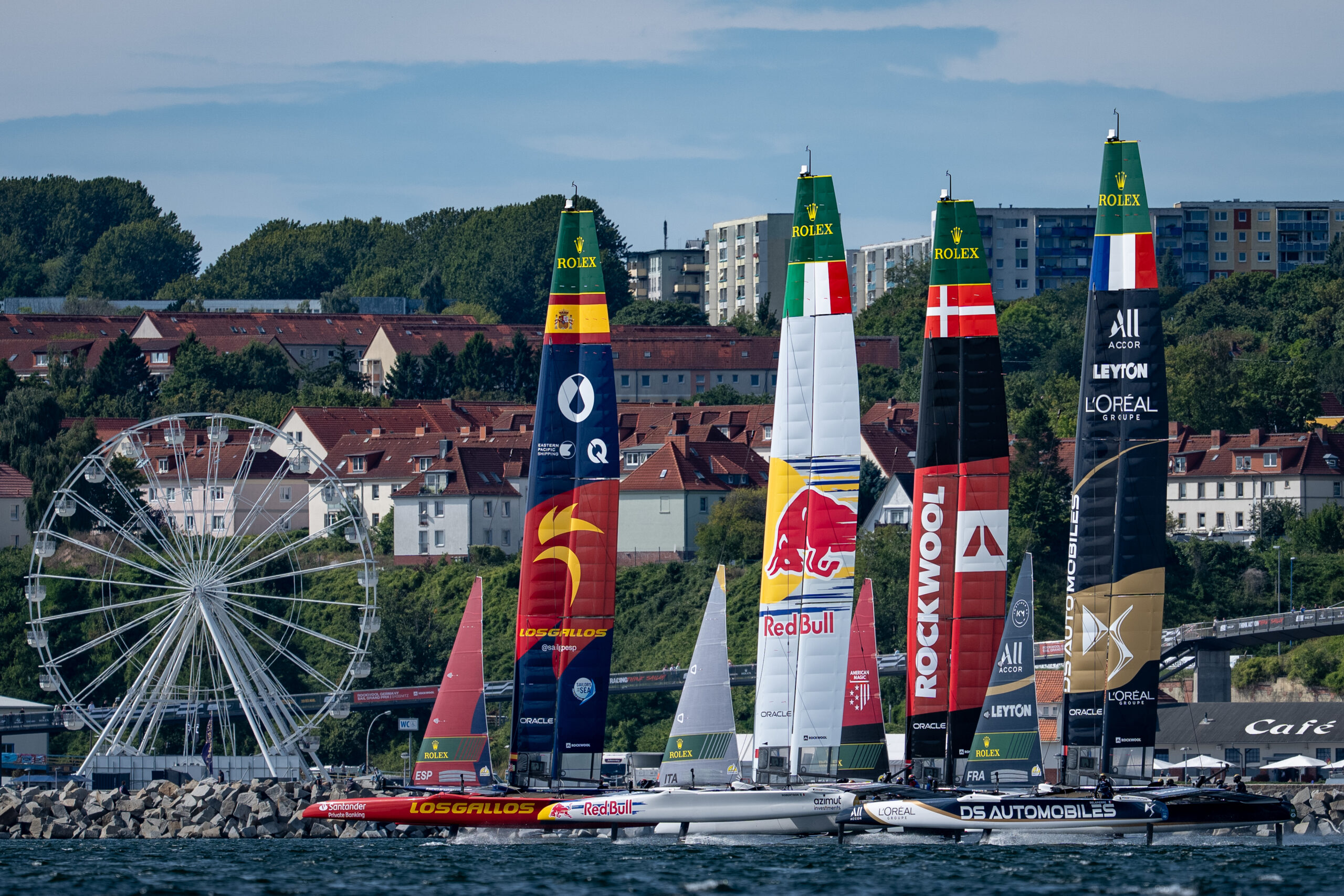 Los Gallos SailGP Team driven by Diego Botin leads Red Bull Italy SailGP Team driven by Phil Robertson, ROCKWOOL Racing SailGP Team driven by Nicolai Sehested and DS Automobiles SailGP Team France driven by Quentin Delapierre during a practice session ahead of the ROCKWOOL Germany Sail Grand Prix in Sassnitz, Germany. Thursday 20 August 2026. Rolex SailGP Championship Event 9 2026 Season. Photo: Jason Ludlow for SailGP. Handout image supplied by SailGP