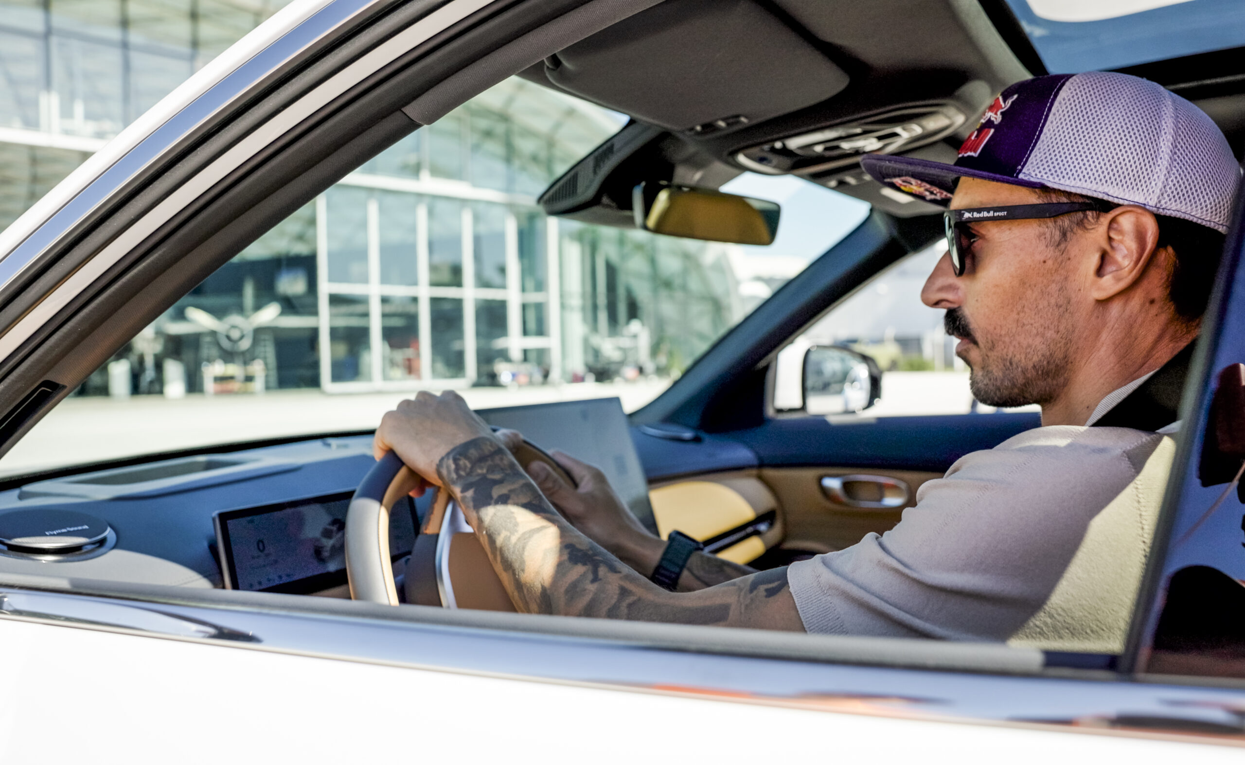 Marco Waltenspiel seen at Red Bull Hangar 7 with Geely car on September 28, 2026.